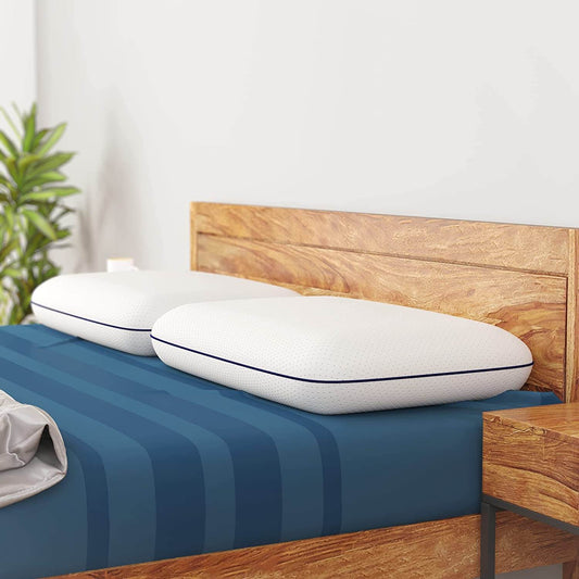 A memory foam pillow showcasing its contouring shape and soft texture, emphasizing comfort and support for restful sleep.
